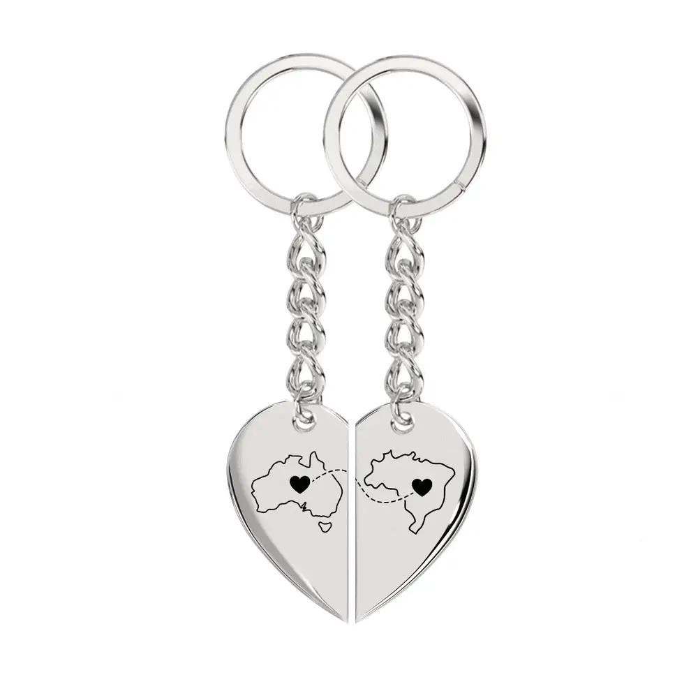 Silberner Herz-Schlüsselanhänger von Exchange Life mit Long-Distance-Motiv, ideal als emotionales Geschenk für Reisende oder Fernbeziehungen.