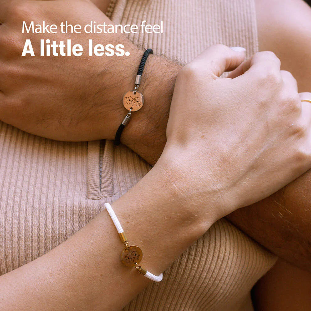 Unisex Rope-Armband mit gravierter Long-Distance-Plakette von Exchange Life, geeignet als persönliches Geschenk für Reisende oder Paare in Fernbeziehungen.